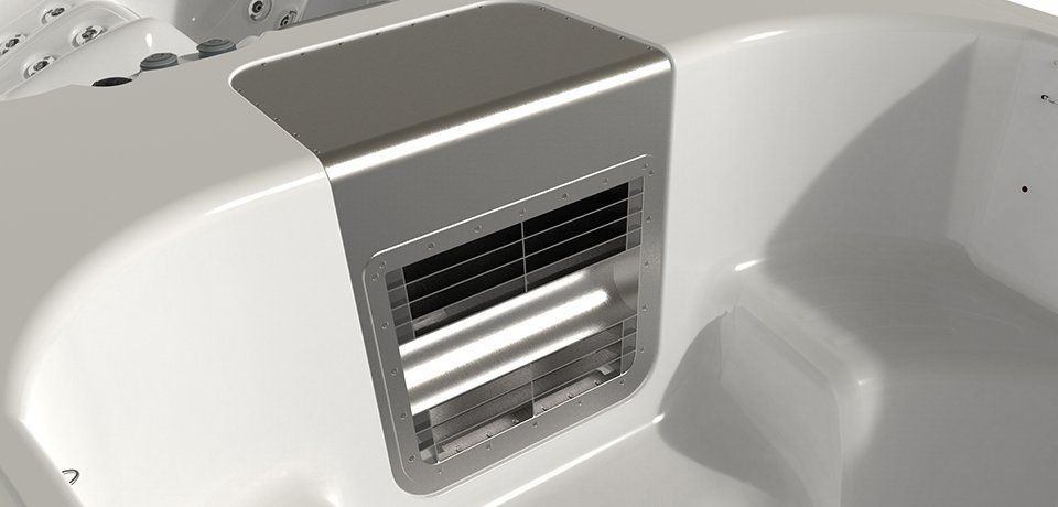 Close-up of a hot tub interior showing a metallic vent cover.