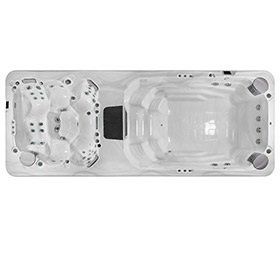 Overhead view of a rectangular swim spa with white interior and gray exterior; divided into hot tub and swim areas.