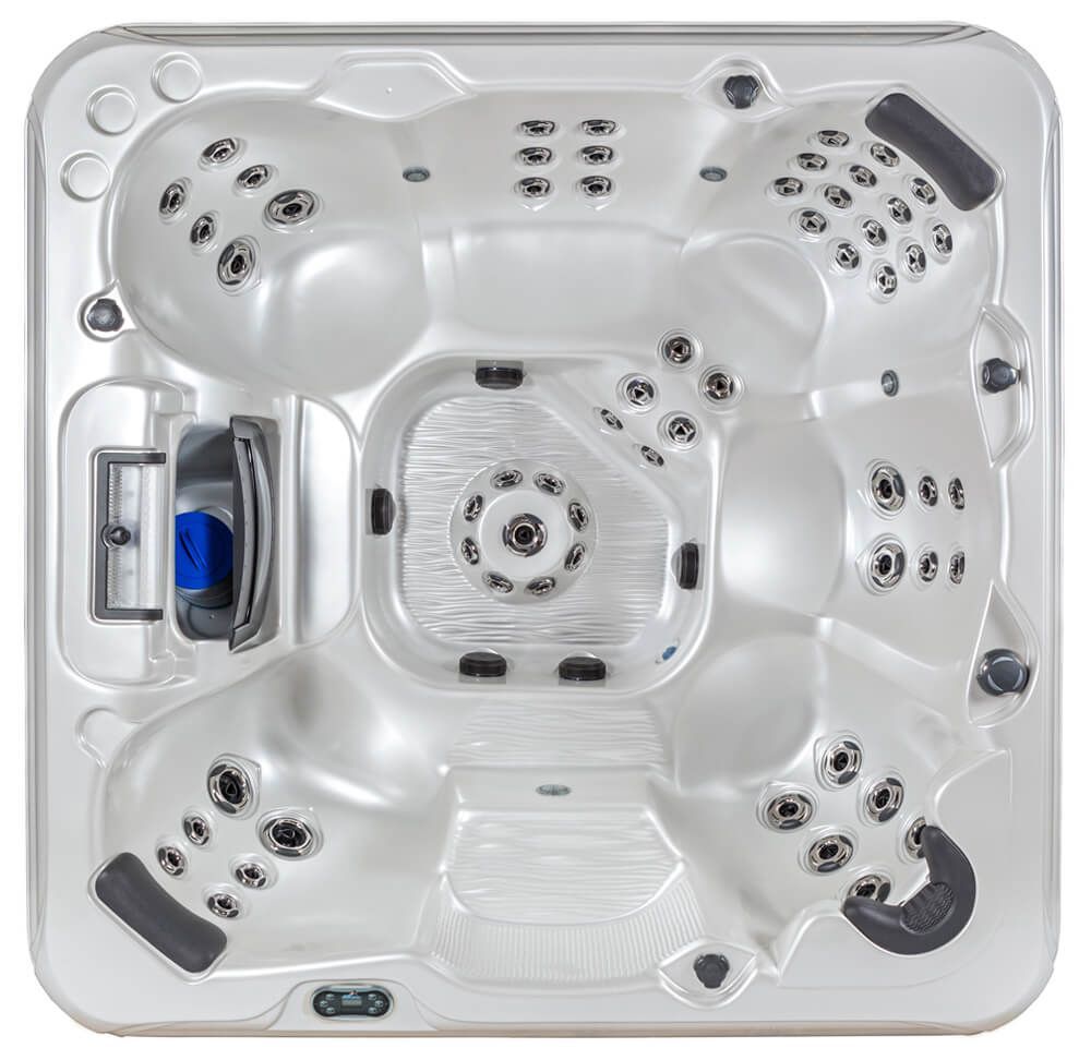 Top-down view of a square, white hot tub featuring multiple molded seats, headrests, and numerous water jets.