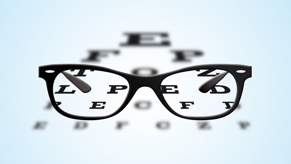 A Pair of Glasses with The Letters L P E and F on Them — John Williams Optometrist in Grafton, NSW