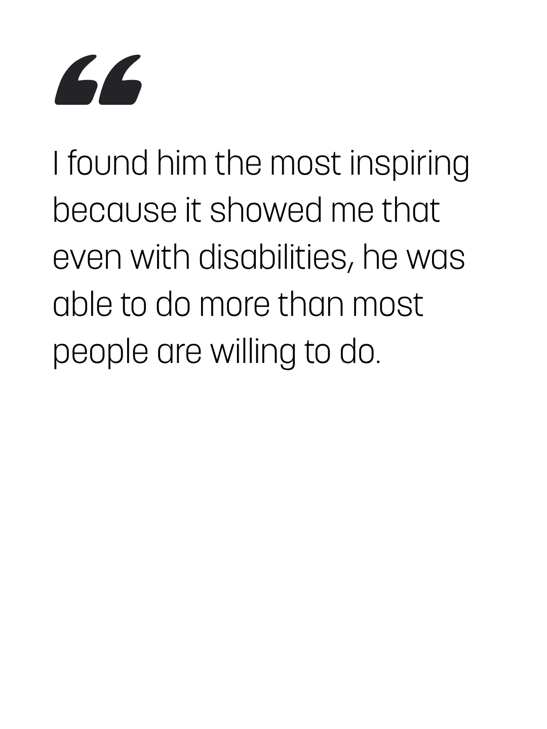 Young man with Down syndrome runs across the finish line after completing a triathlon