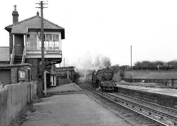 Southbound passenger train passing Signal Box, 1950s.