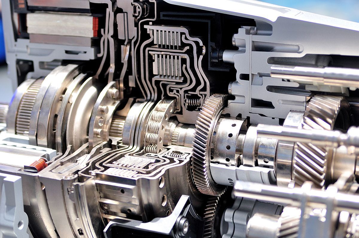 A close up of a gearbox in a car.