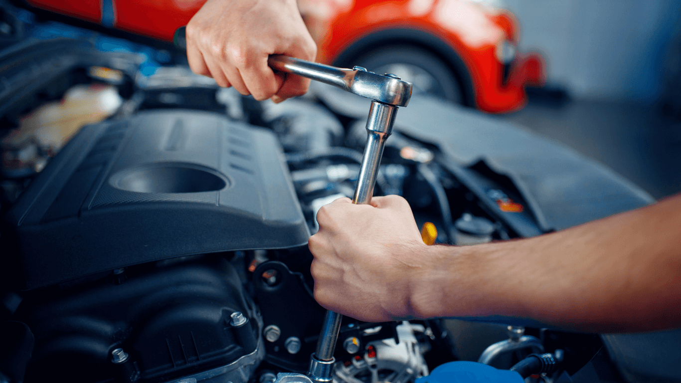 a mechanic doing an auto repair on-site