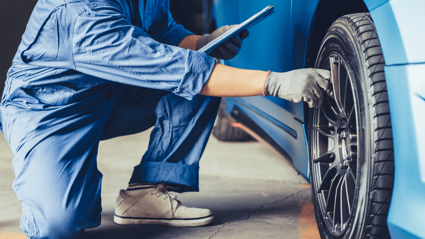 a mechanic performing a pre-purchase inspection
