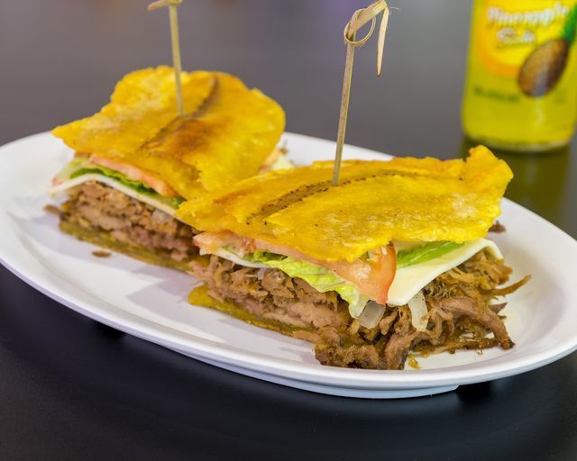 Hand Made Pork and Slice Banana on Top — Union, NJ — El Lechon De Negron