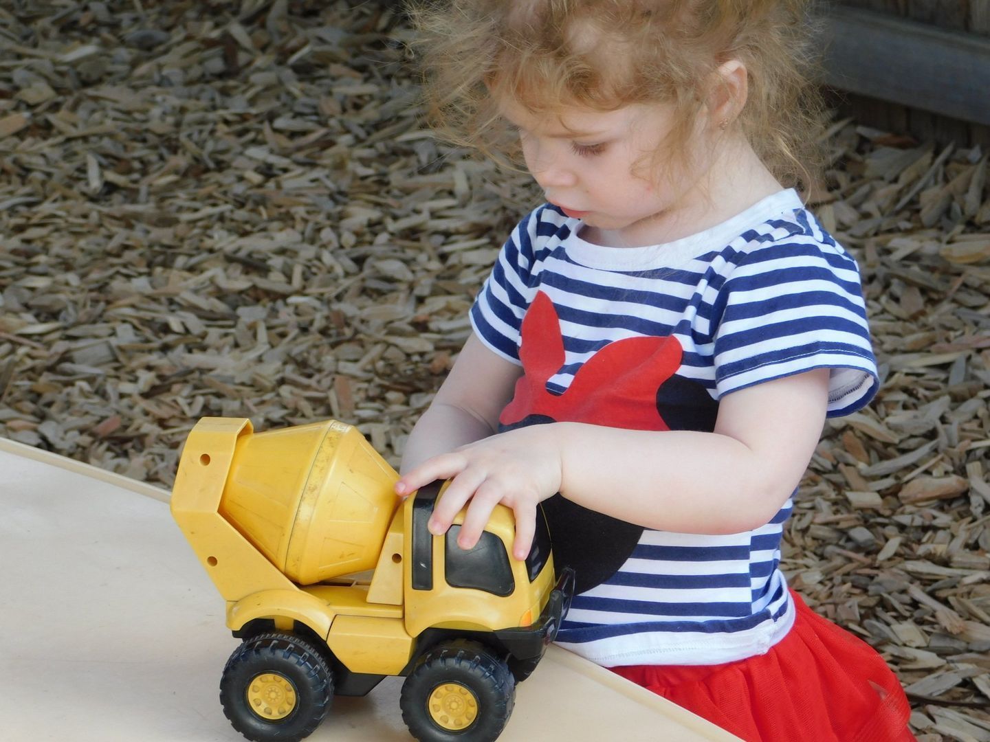 Young child with curly red hair