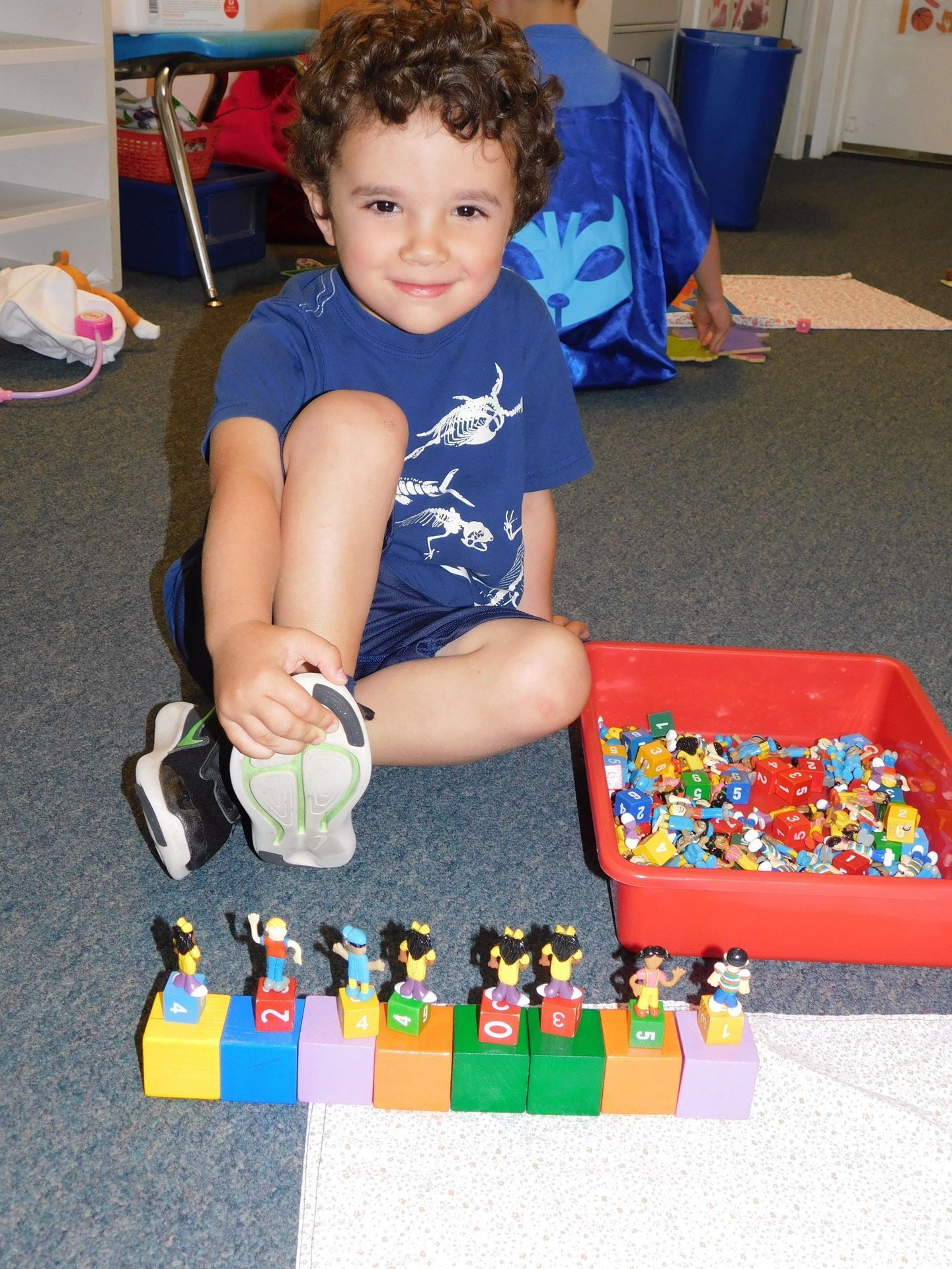 Kid in blue shirt