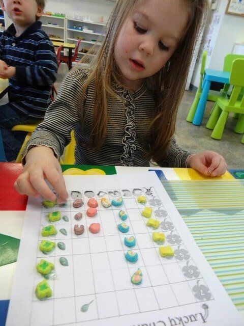 Girl playing a Lucky Charm game