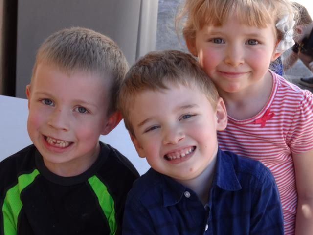 Three smiling children