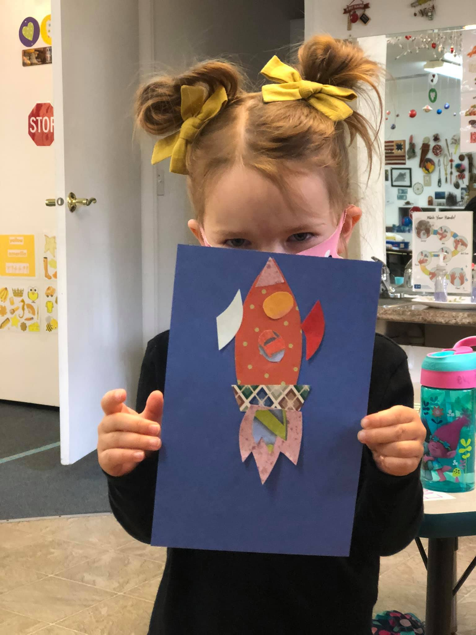 Young girl with hair buns