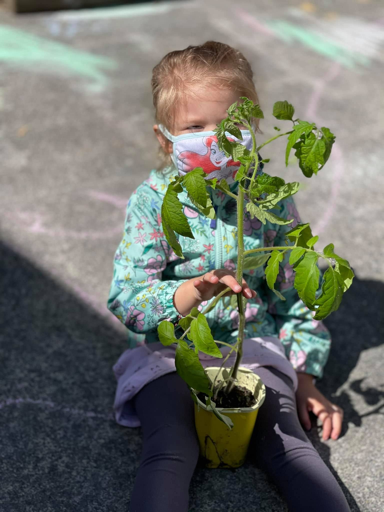 Young child in mask