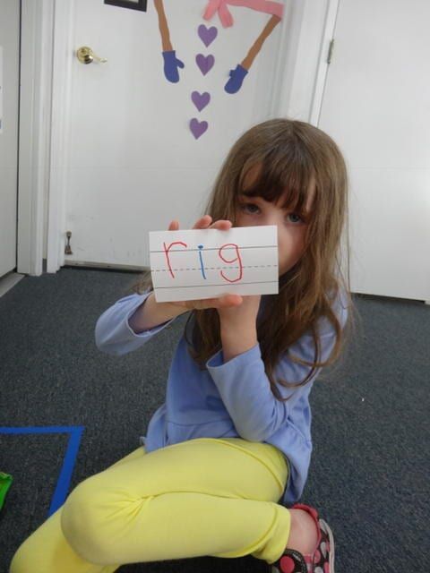 Girl holding a card