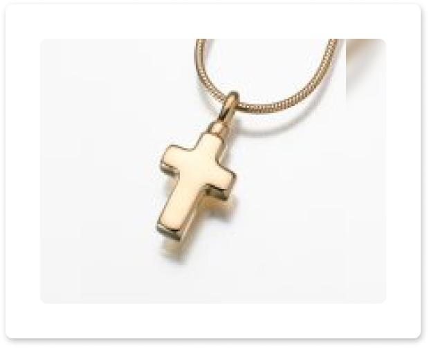 Gold cross pendant on a chain necklace