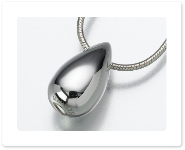 Silver teardrop pendant necklace on a white background