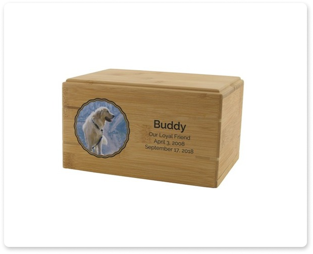 Wooden pet urn with a circular dog photo and engraved name “Buddy” on the front