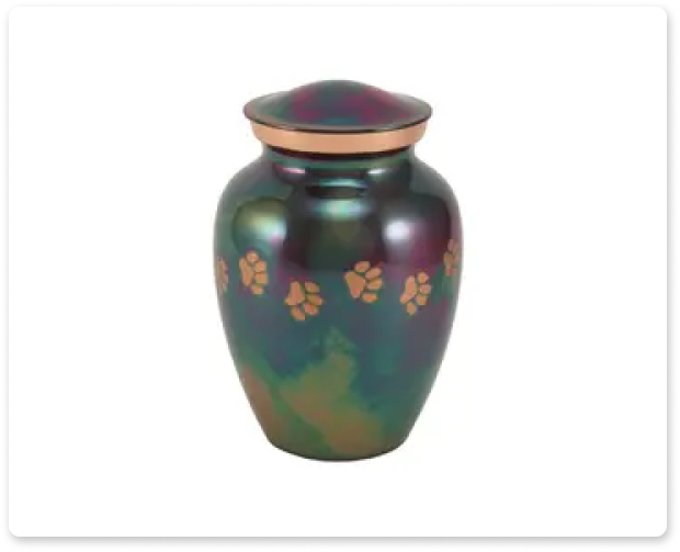 Iridescent ceramic urn with floral motifs and a fitted lid