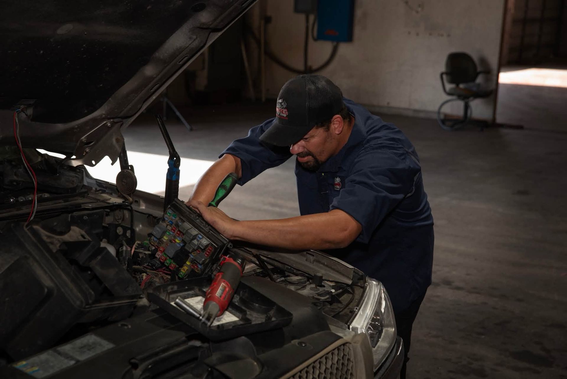 JLB Diesel Shop Owner at work