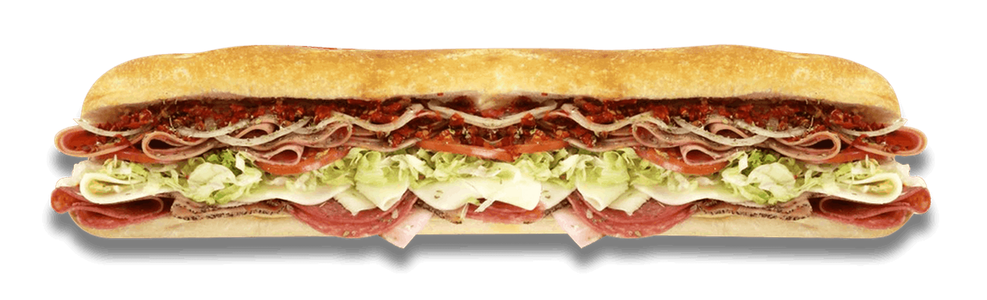 A long sub sandwich with layers of meat, lettuce, tomatoes, and cheese on a white background