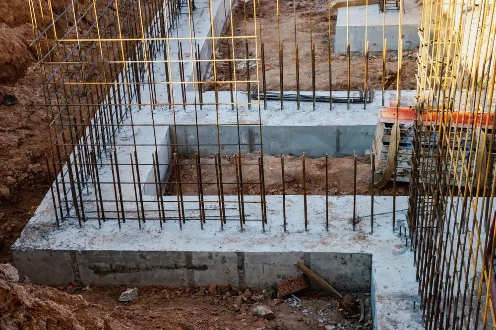Concrete Foundation Footings With Vertical Steel Rebar — Copp & Co Civil Plant Hire in Airlie Beach, QLD
