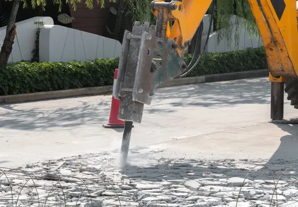 A Yellow Hydraulic Breaker Attachment — Copp & Co Civil Plant Hire in Mount Julian, QLD