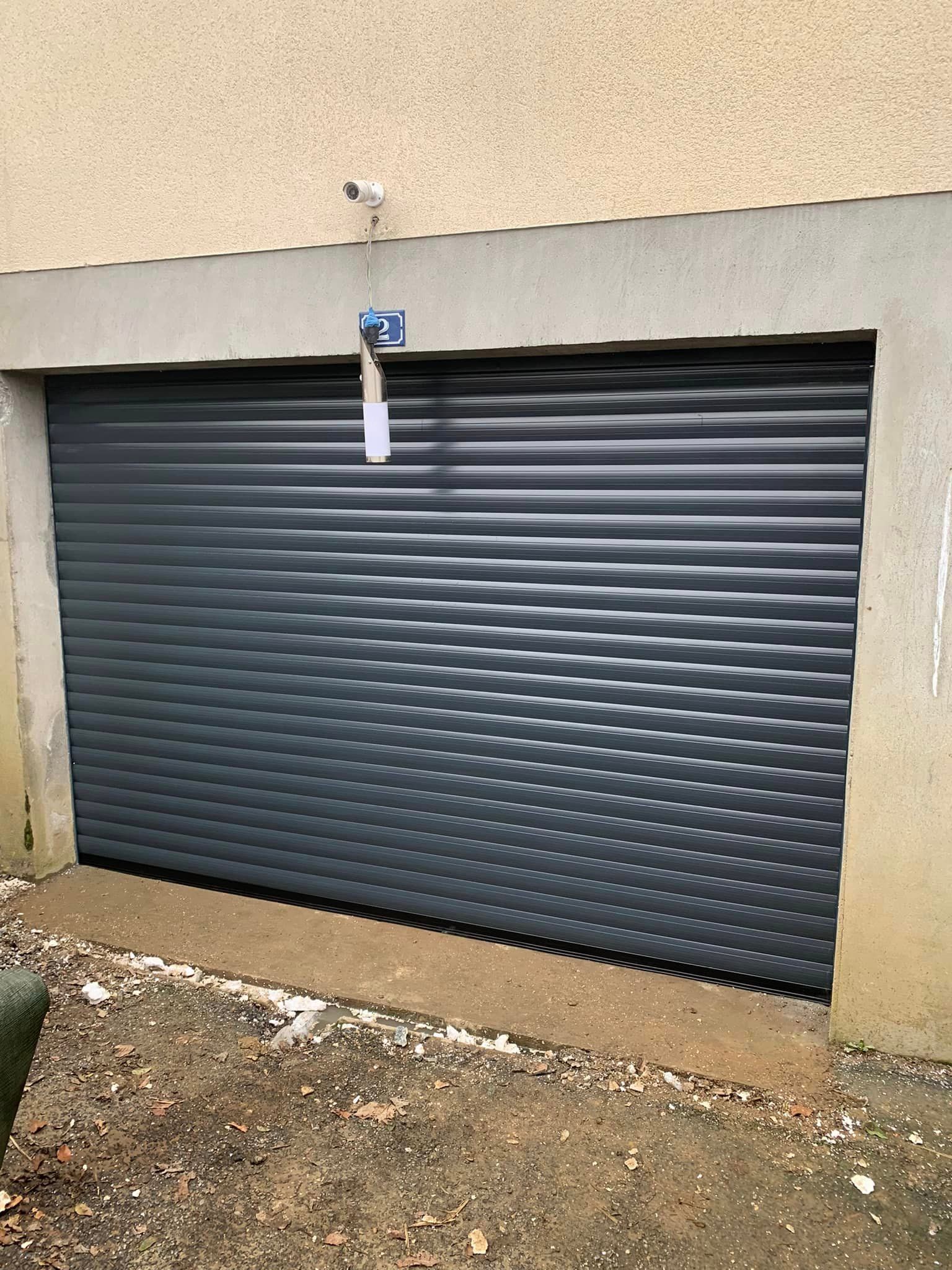 Porte de garage installée à Yvetot par ma menuiserie
