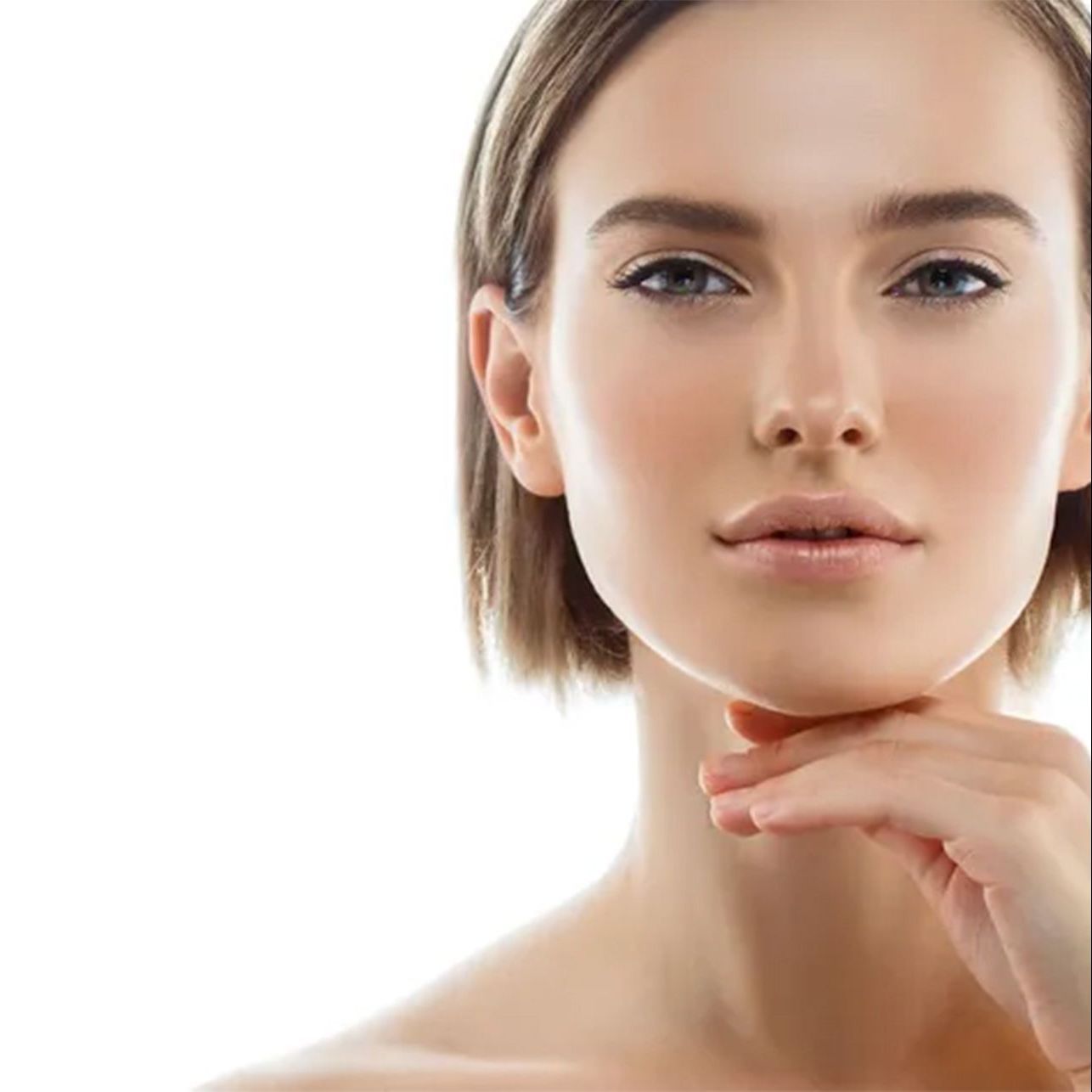 A woman is getting a laser treatment on her face.