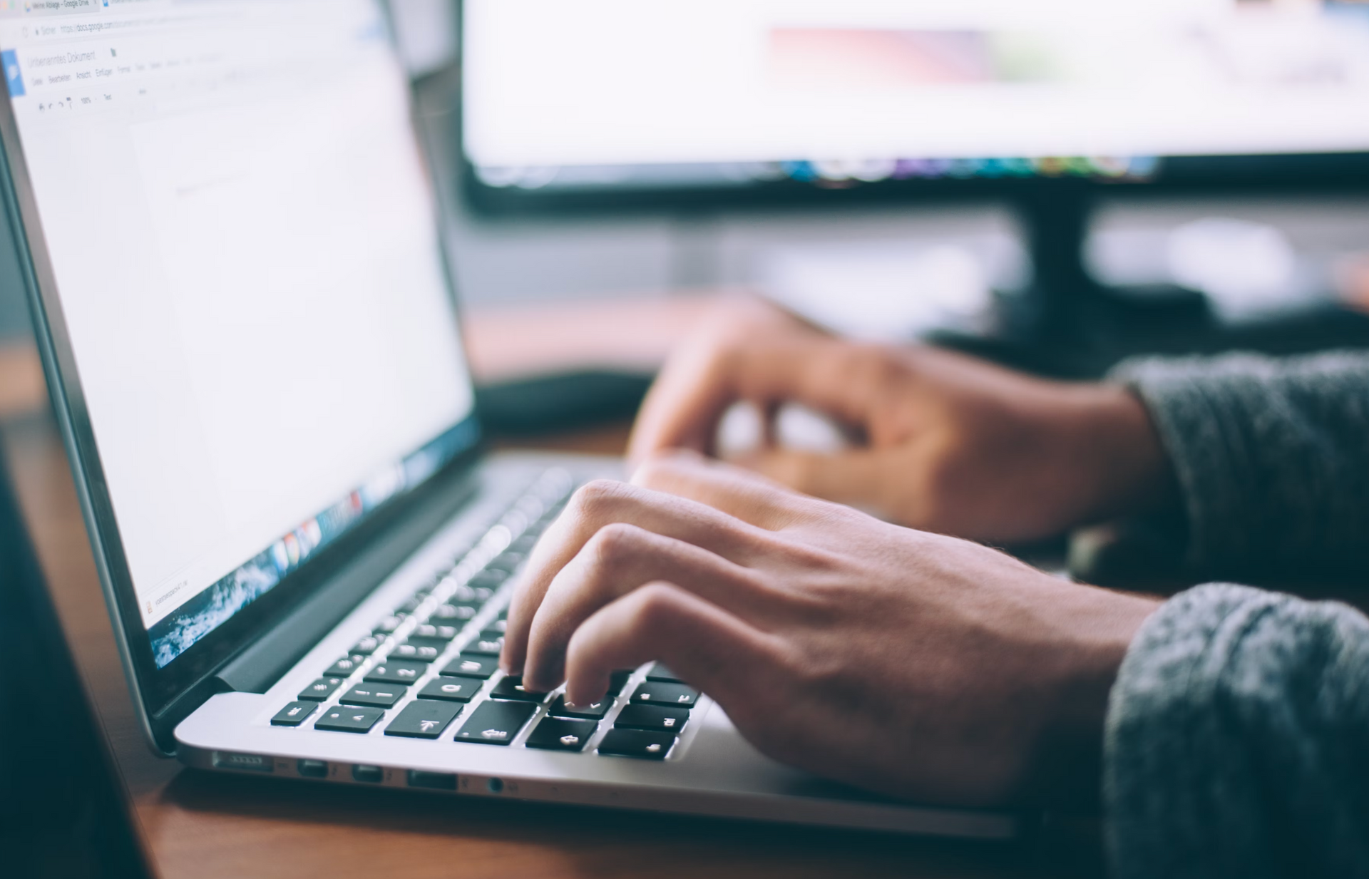 A person utilizing their computer for missions work.