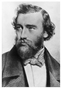 Een zwart-witfoto van een man met baard en vlinderdas