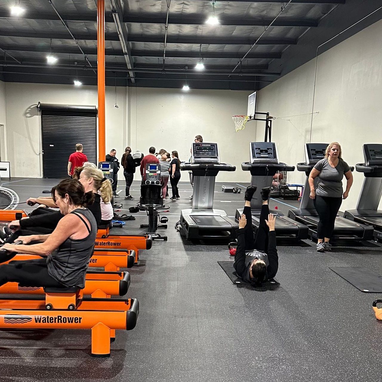 A group of people are working out at the adaptive athlete.