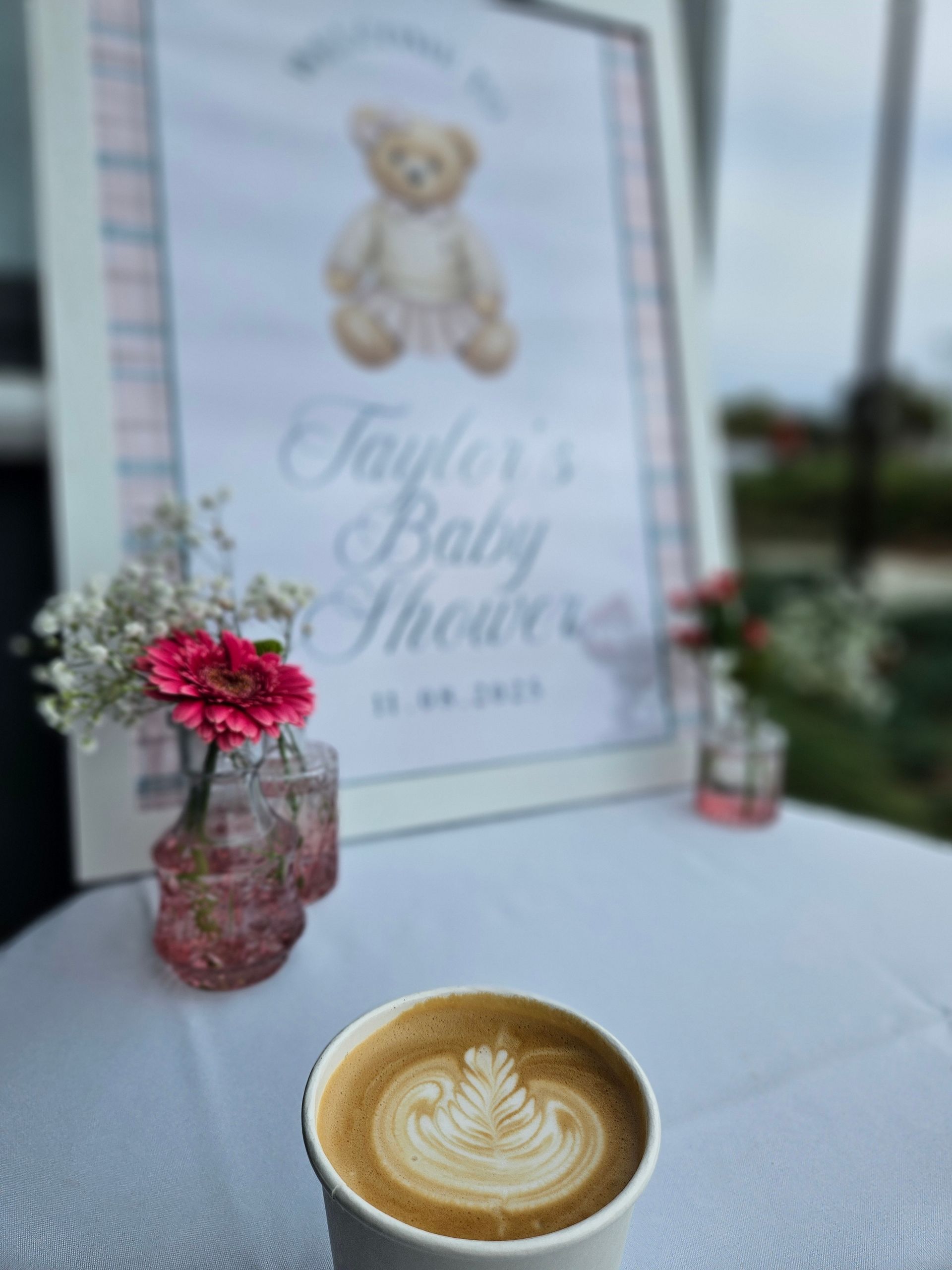 Handcrafted latte art served at a baby shower by Bake and Grind