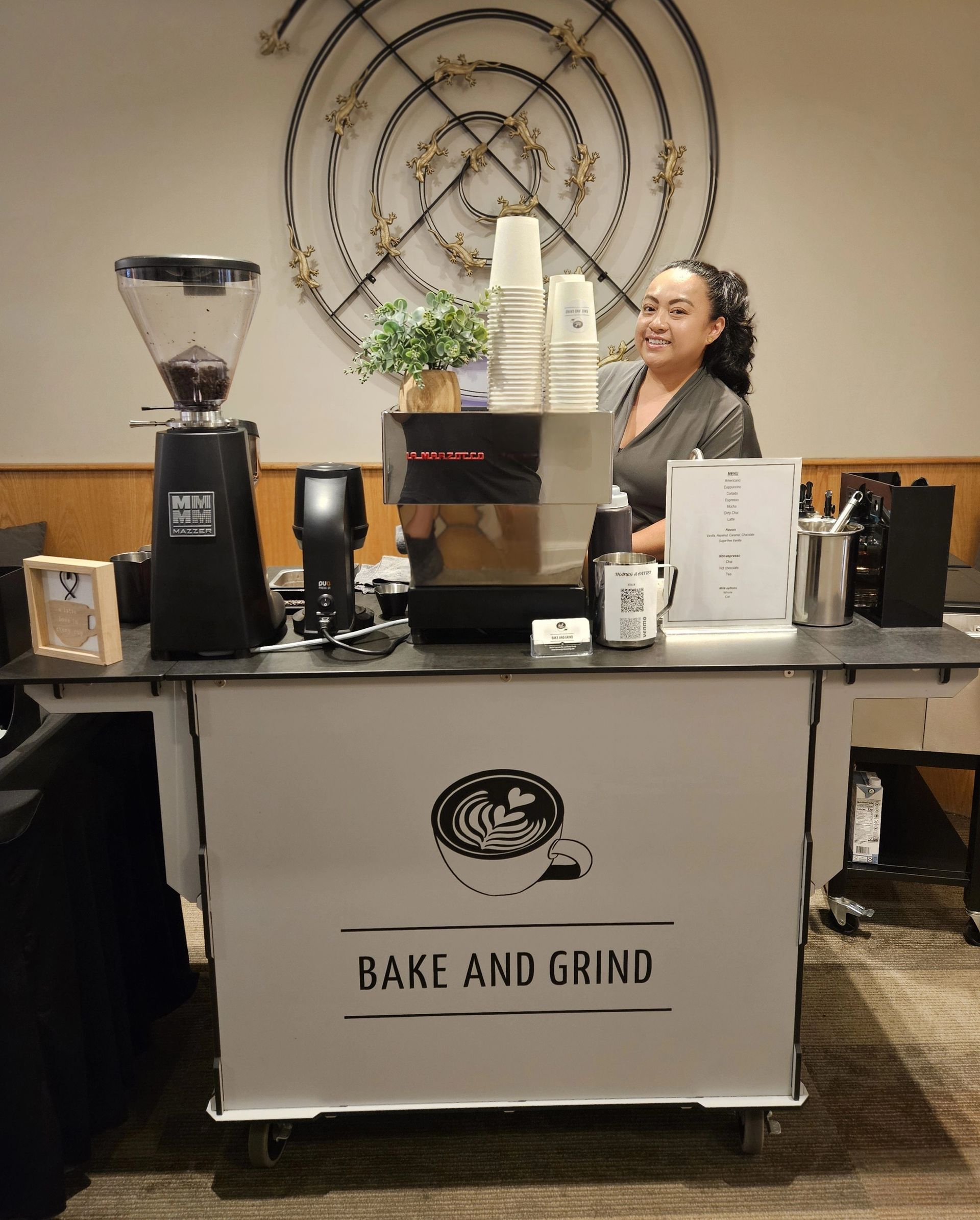 Professional barista serving handcrafted espresso from the Bake and Grind mobile coffee cart