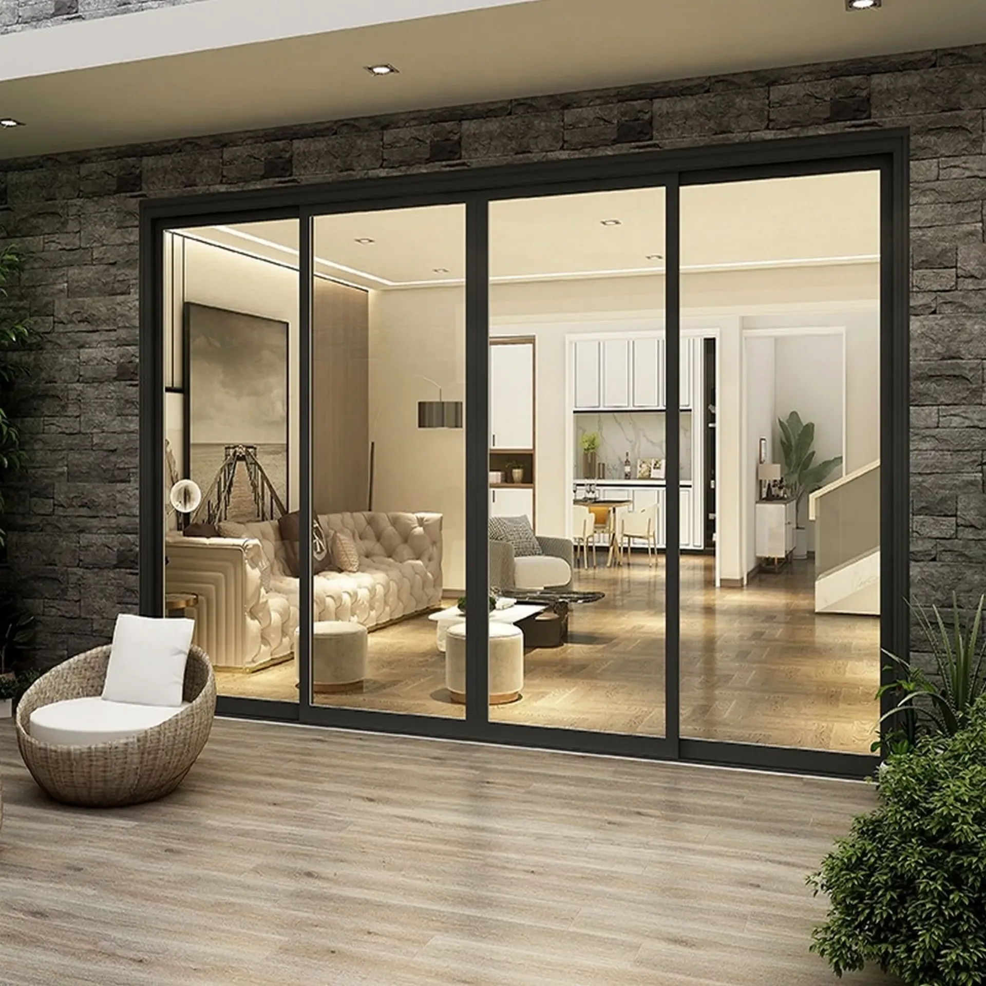 Sliding glass doors open onto a patio with a wicker chair and a view of an interior living space.