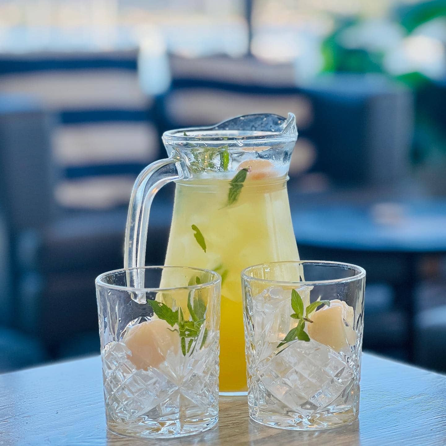 A Pitcher of Lemonade and Two Glasses of Lemonade on a Table — Gosford Sailing Club in Gosford, NSW