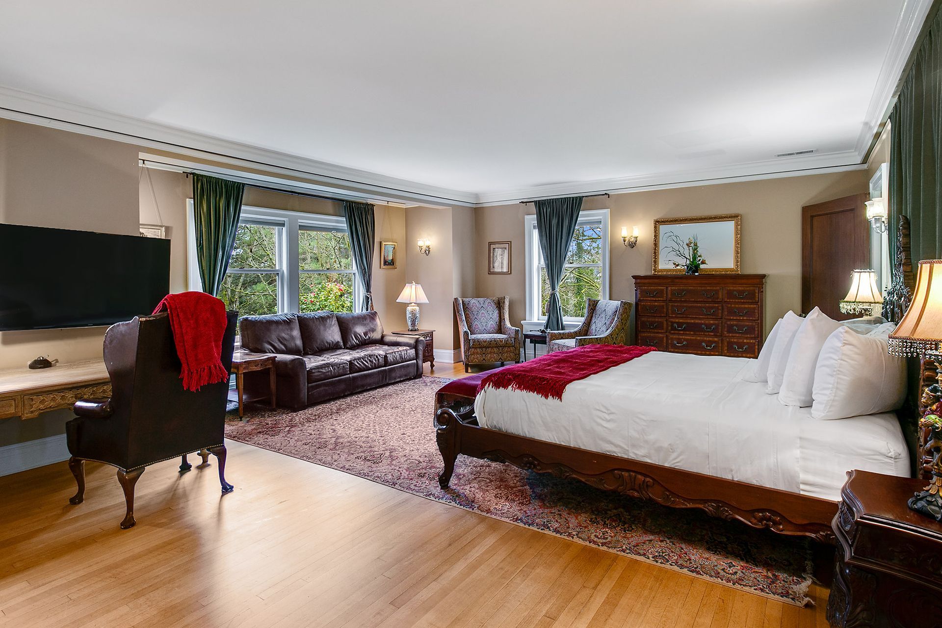 There is a large bed in the middle of the room.