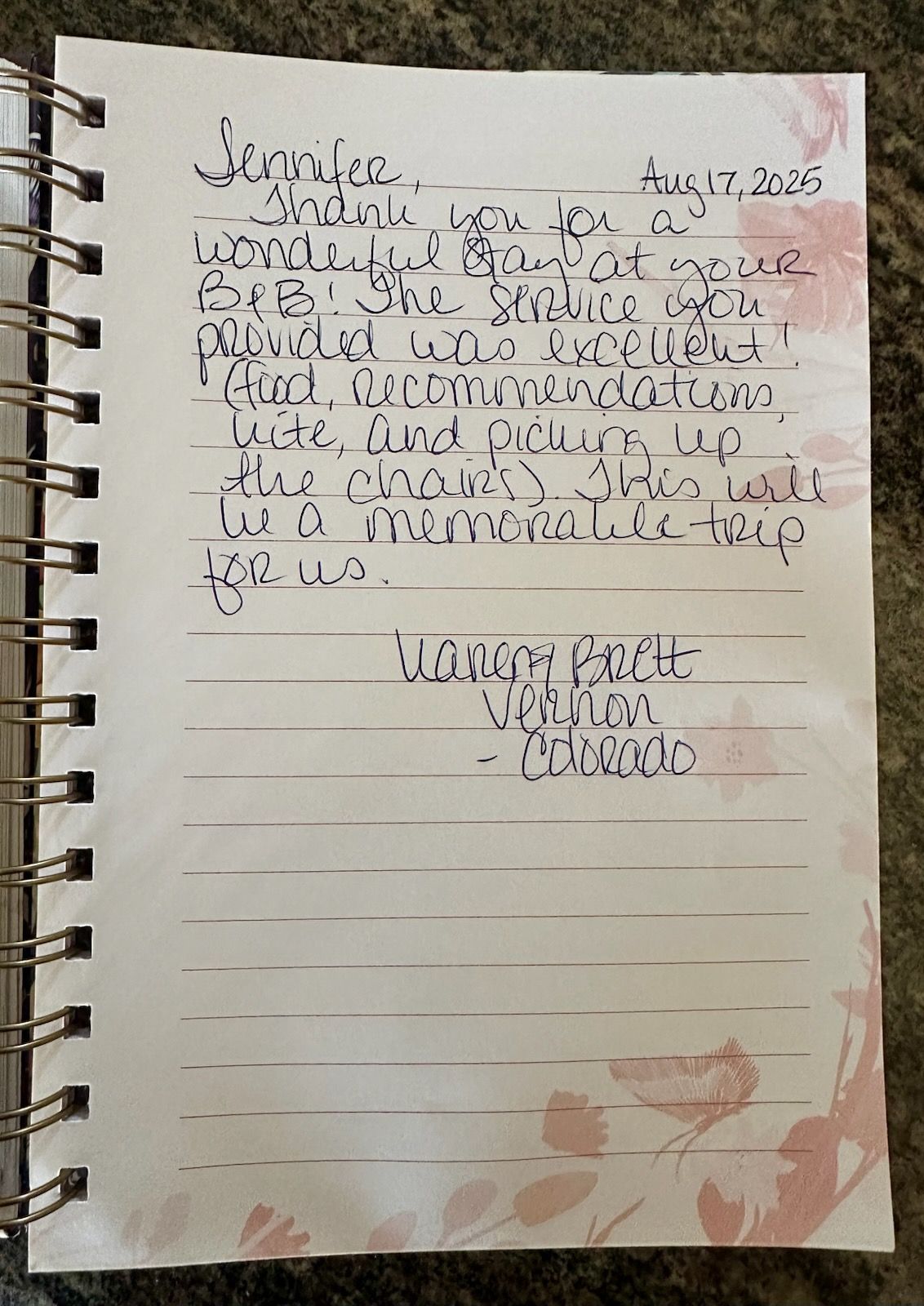 Handwritten note in a notebook. Says