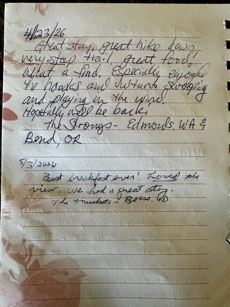 Handwritten note on lined paper with faint ink, stained edges, and a signature at the bottom.