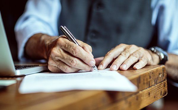 Old man pen and paper