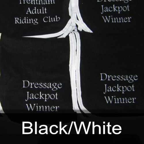 A black and white shirt that says dressage jackpot winner
