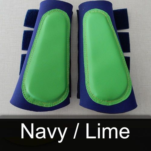 A pair of navy and lime boots with green padding