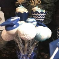 Blue-and-white candy bouquet with glittery sticks and patterned paper cups