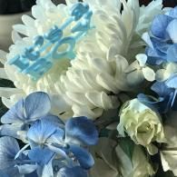 Blue and white flowers in a soft close-up bouquet