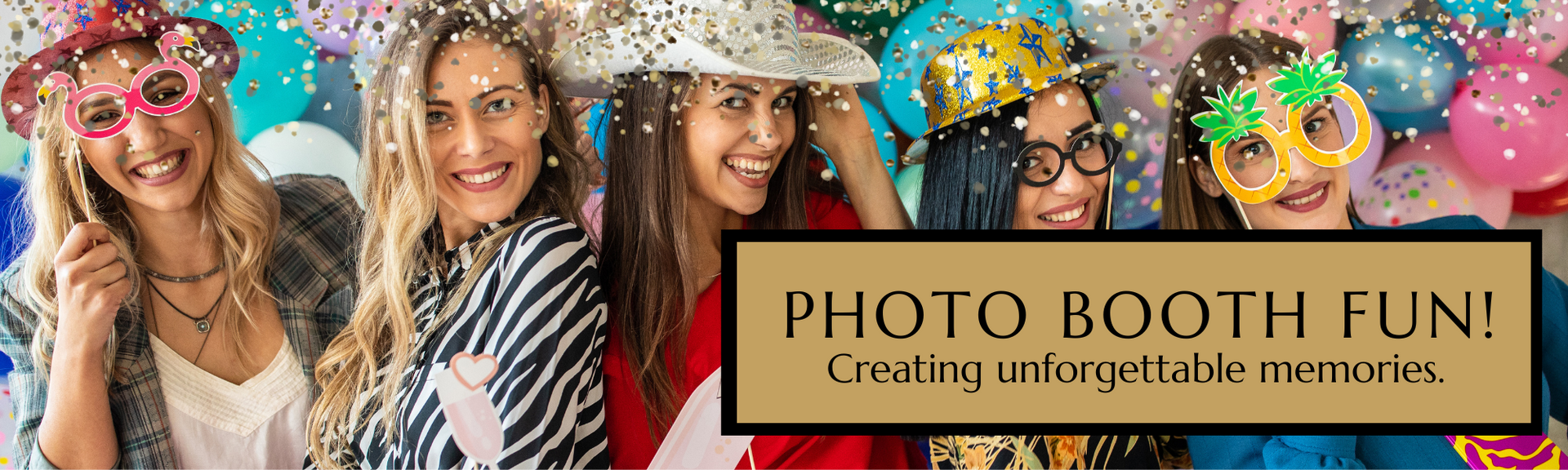 Four women in colorful hats and props posing for a photo booth fun sign