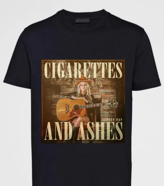 Black t-shirt with a graphic of a woman with a guitar; text reads 