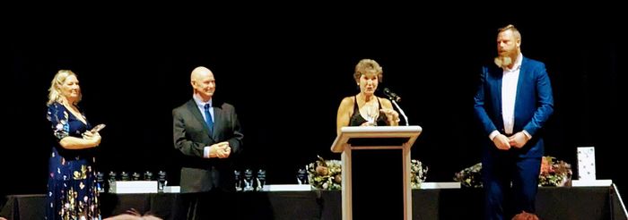 A Group of People are Giving an Acceptance Speech