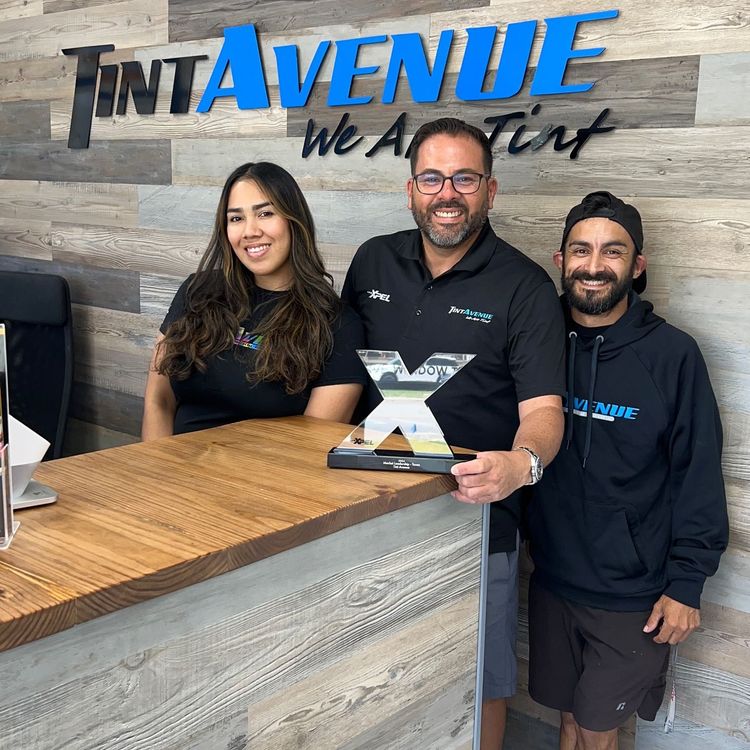 Owner and team at Tint Avenue office