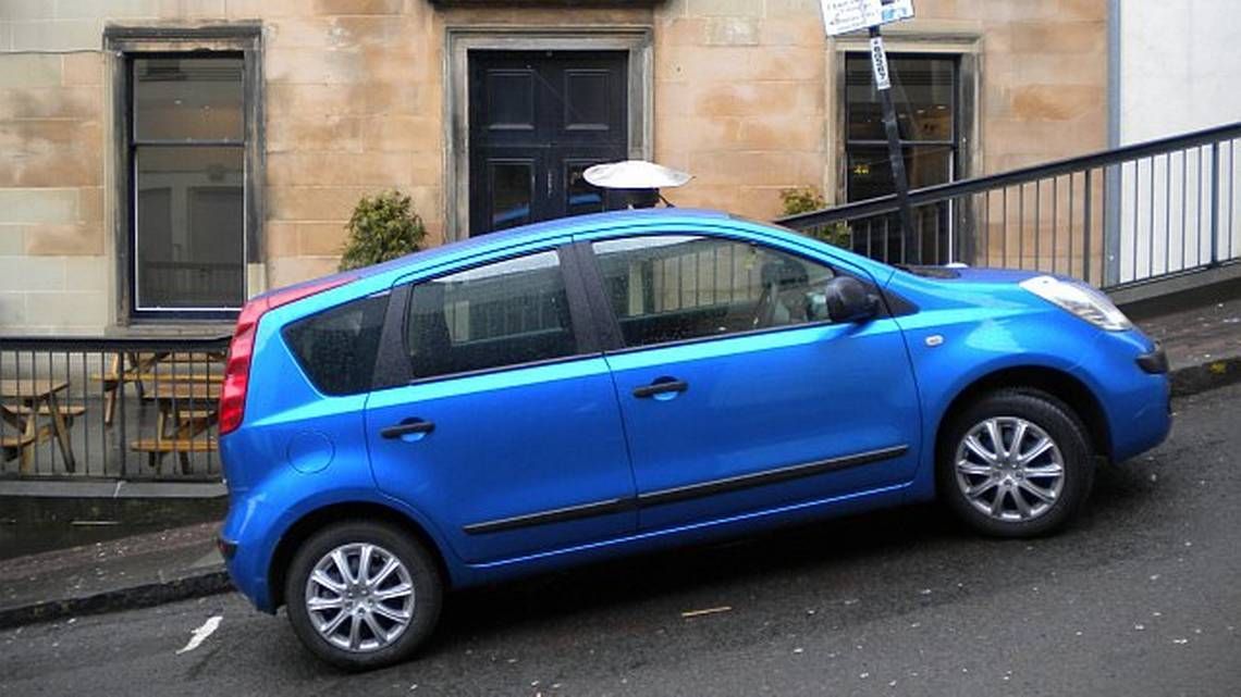 parked car on a hill