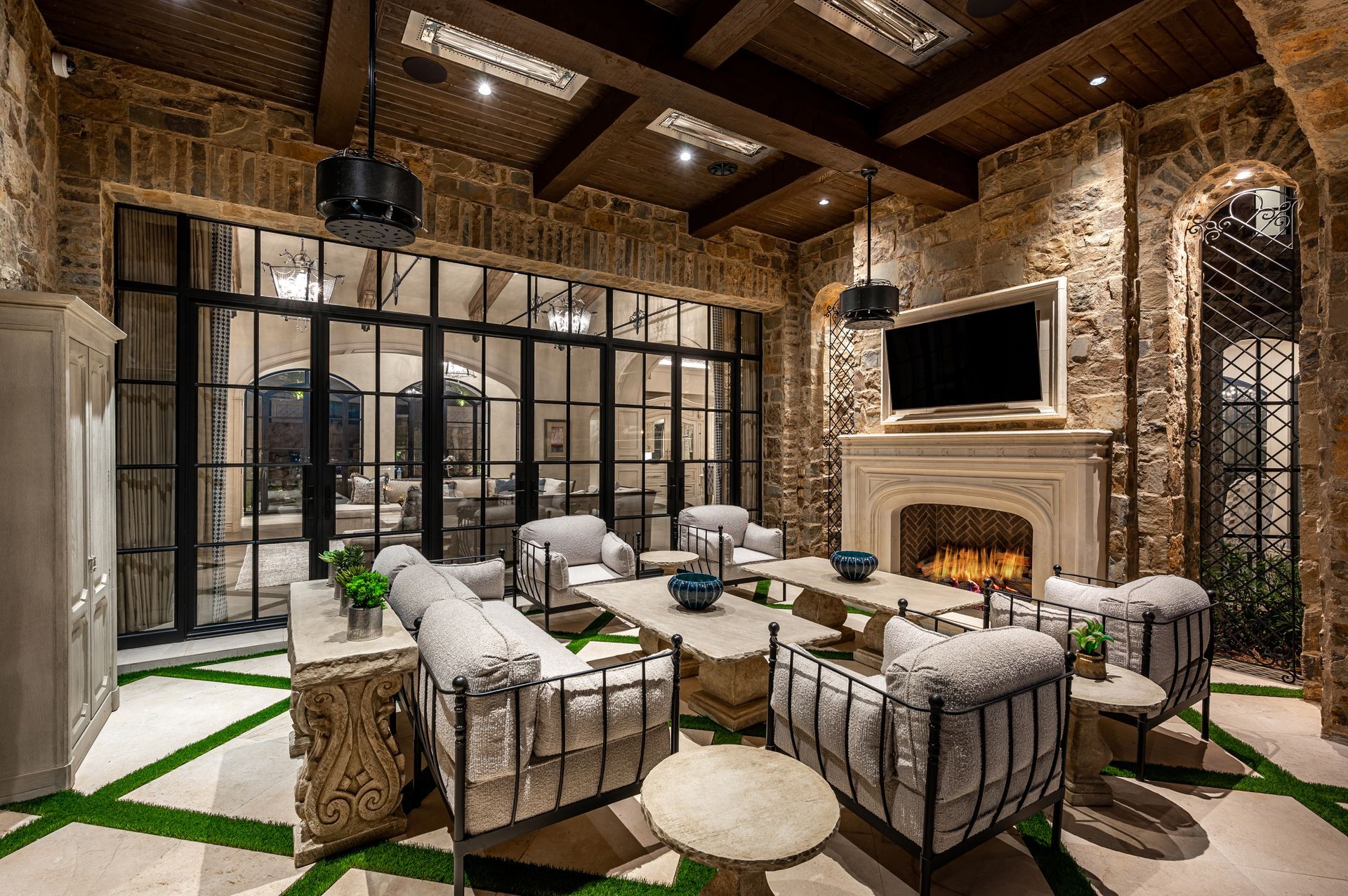 A living room filled with furniture and a fireplace.