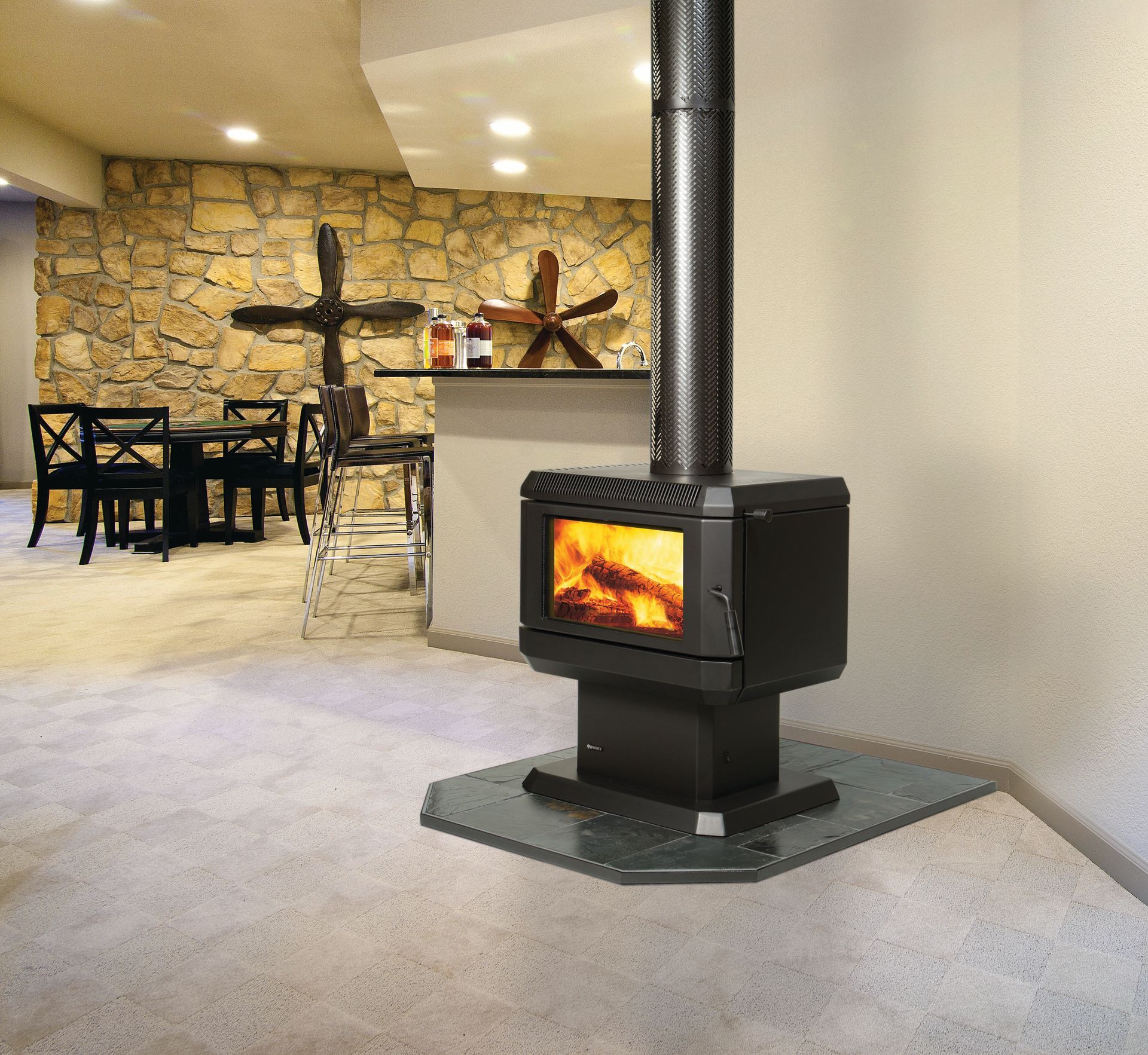 A Fireplace With A Fire In It And A Fire Screen — Mid Coast Mowers In Taree, NSW