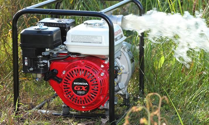 A Honda Gx Engine Is Pumping Water Out Of A Hose — Mid Coast Mowers In Taree, NSW